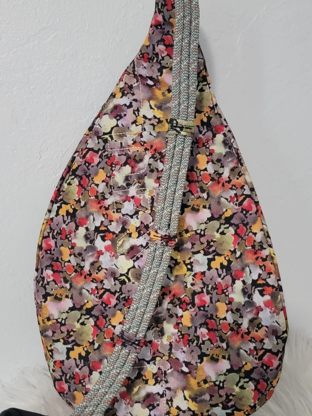 Kavu Floral-Pattern Sling Backpack in Pink, Yellow, Black, Cream